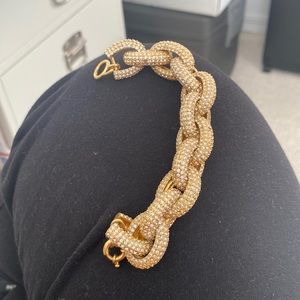 Gold chain link bracelet with rhinestones.